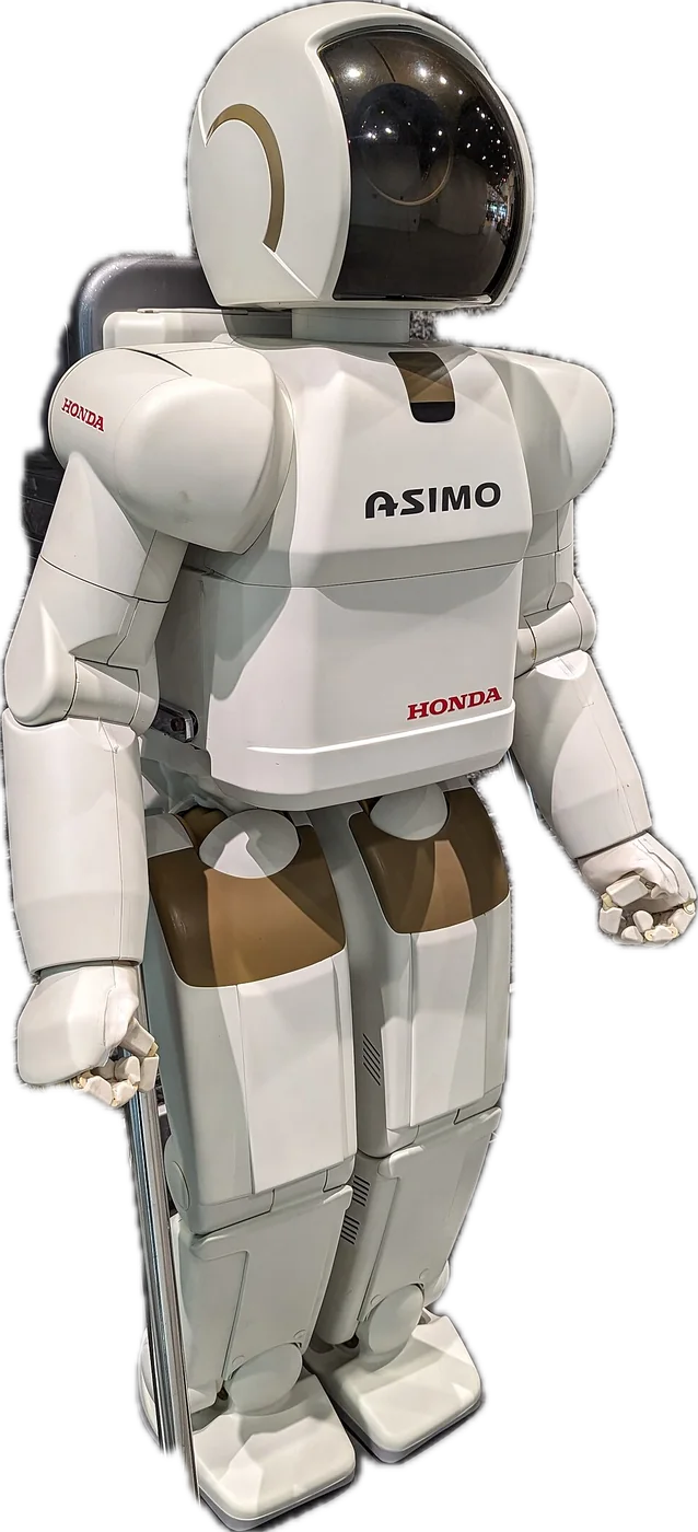 ASIMO。白い外装でバックパックを背負った二足歩行ロボット