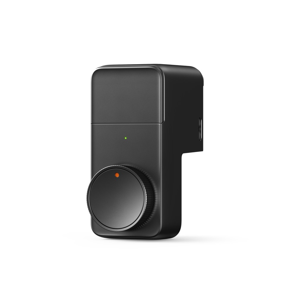 白背景の SwitchBot ロック Pro。黒い本体の下部に円形のつまみがあり、正面に緑のインジケーター